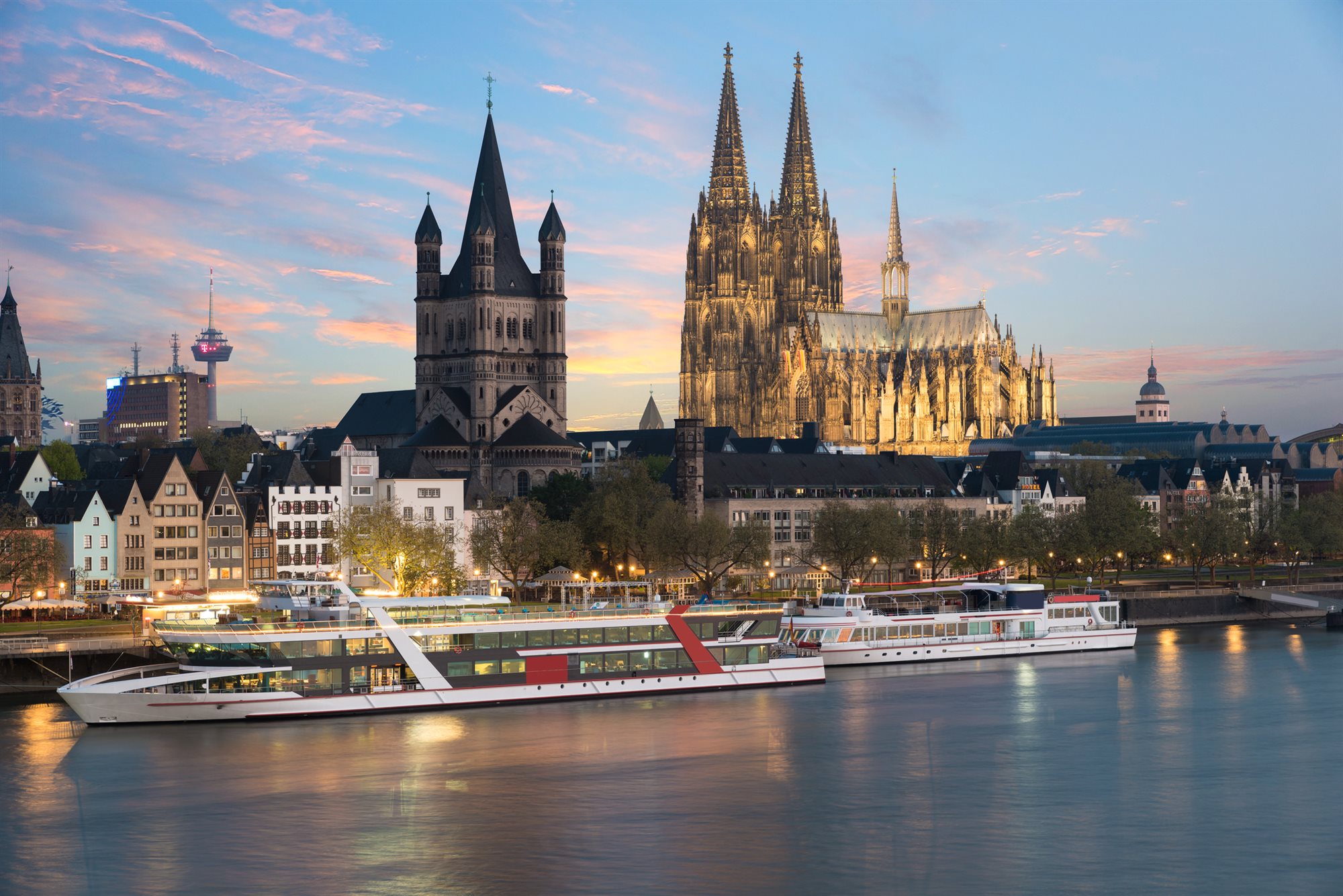 River cruise ship moored below Rhine castles and vineyards River cruise ship moored below Rhine castles and vineyards